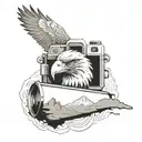 simple camera with soaring eagle flying over the horizon tattoo design idea