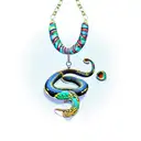 A ballpython snake wrapped around a Moana necklace tattoo design idea