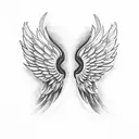Wings with Alaska themes below it tattoo design idea