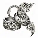 Interlocking wedding rings with intricate floral patterns intertwined tattoo design idea