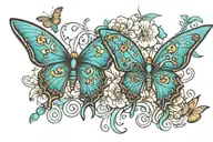 turquoise butterflies with the word slut in the design tattoo design idea