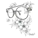 eyeglass with flowers ontop tattoo design idea