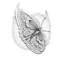 A butterfly emerging from a cocoon made of intricate patterns tattoo design idea