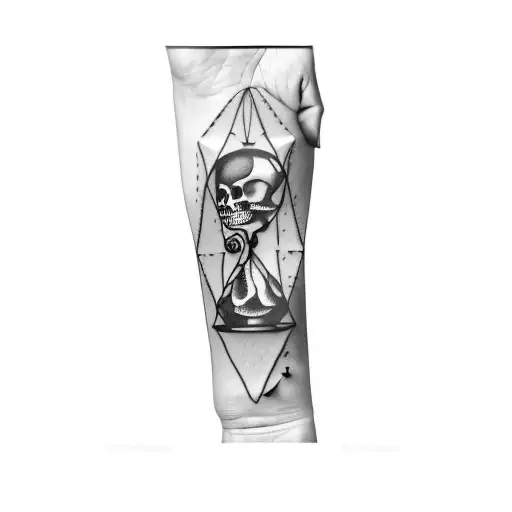 skeleton hand holding an hourglass tattoo design idea