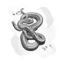A snake coiled around a bricklayer's tool, with playing cards scattered around tattoo design idea