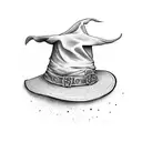 witch hat with writing "une sorcière comme les autres" tattoo design idea