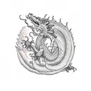 tiny sleeping dragon tattoo design idea