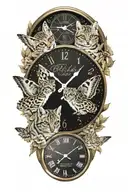 2 clocks with dates wings spread bobcat face incorporated tattoo design idea