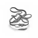bracelet: two snakes biting each other's tails, one light and one dark. tattoo design idea