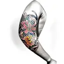 floral arm sleeve Australian native tattoo design idea