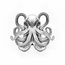 A developer coding with a black and grey octopus as a companion tattoo design idea