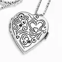 A trail of stars leading to a heart-shaped locket with 'daughter' engraved on it tattoo design idea