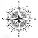 A compass rose surrounded by various marine creatures like whales, sharks, and sea turtles tattoo design idea