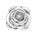 A blackwork tattoo showcasing a detailed Louis Vuitton pattern with ghostly roses tattoo design idea