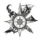 compass and mountain range silhouette tattoo design idea