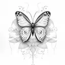 A delicate dotwork design of a butterfly and hummingbird surrounded by lilies tattoo design idea
