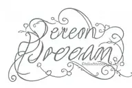 the word dream written I. cursive with little hearts around it tattoo design idea