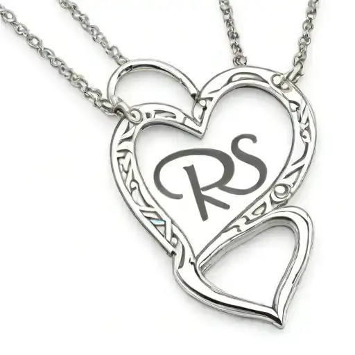 coquette open heart locket with letters R S inside tattoo design idea