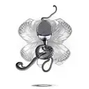A machined snake coiled around a microphone with butterfly wings tattoo design idea