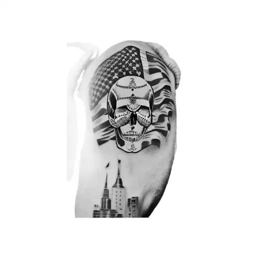 a skull and an american flag flying eagle underneath  tattoo design idea