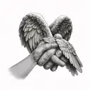  angel wings and a baby’s hand holding on to a mothers finger tattoo design idea