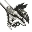  angel wings and a baby’s hand holding on to a mothers finger tattoo design idea
