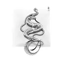 snake warping around collar bone with the number 14 in the middle  tattoo design idea