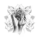 A serene praying hands surrounded by delicate roses tattoo design idea