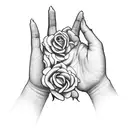 A serene praying hands surrounded by delicate roses tattoo design idea