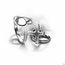 wedding ring and pacifier in cross of christ tattoo design idea