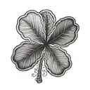 Arkansas outline with negative space surrounding a five leaf clover  tattoo design idea