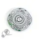 yin yang symbol, made by using celtic  tree of life and two  magpies in celtic design tattoo design idea