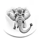 elephant head with roses, lillis and snap dragons surrounding it tattoo design idea