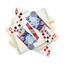 A traditional style tattoo of a cigar and a glass of whiskey with playing cards and poker chips around them tattoo design idea