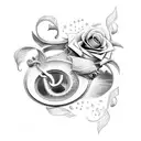 upside down horse shoe with roses creeping up it tattoo design idea