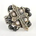 Black out line on a Finger ring of a rosary with the beads wrapped around the knuckles of the finger and the small cross tattoo design idea