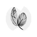 An intricate blackwork tattoo of a feather pen transforming into a flock of birds tattoo design idea