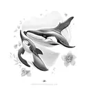 two orcas, mom and baby, with flowers on them tattoo design idea