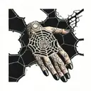 spider web that looks like a hand with nezuko curse marks around the forearm tattoo design idea