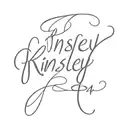 name Kinsley Ray cursive writing in the shape of a cross tattoo design idea