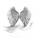 angel wings with halo with the name "Mary Cole" below the wings tattoo design idea