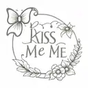 kiss me written and a bow around it  tattoo design idea