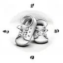 baby foot mark in shading with an analog clock showing time of birth 4.03 pm, it also has a river flowing  tattoo design idea