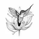 Hummingbird on the side of a lily tattoo design idea