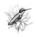Hummingbird on the side of a lily tattoo design idea