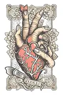 woman's hand with almond tip nails holding a human heart tattoo design idea