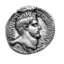 an ancient roman coin tattoo design idea