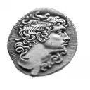 an ancient roman coin tattoo design idea