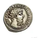 an ancient roman coin tattoo design idea