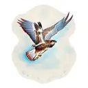 side view red tailed hawk diving with wings up clutching a banner tattoo design idea
